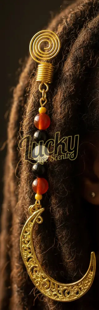 Decorative pendant with gold spiral, moon shape, and beads