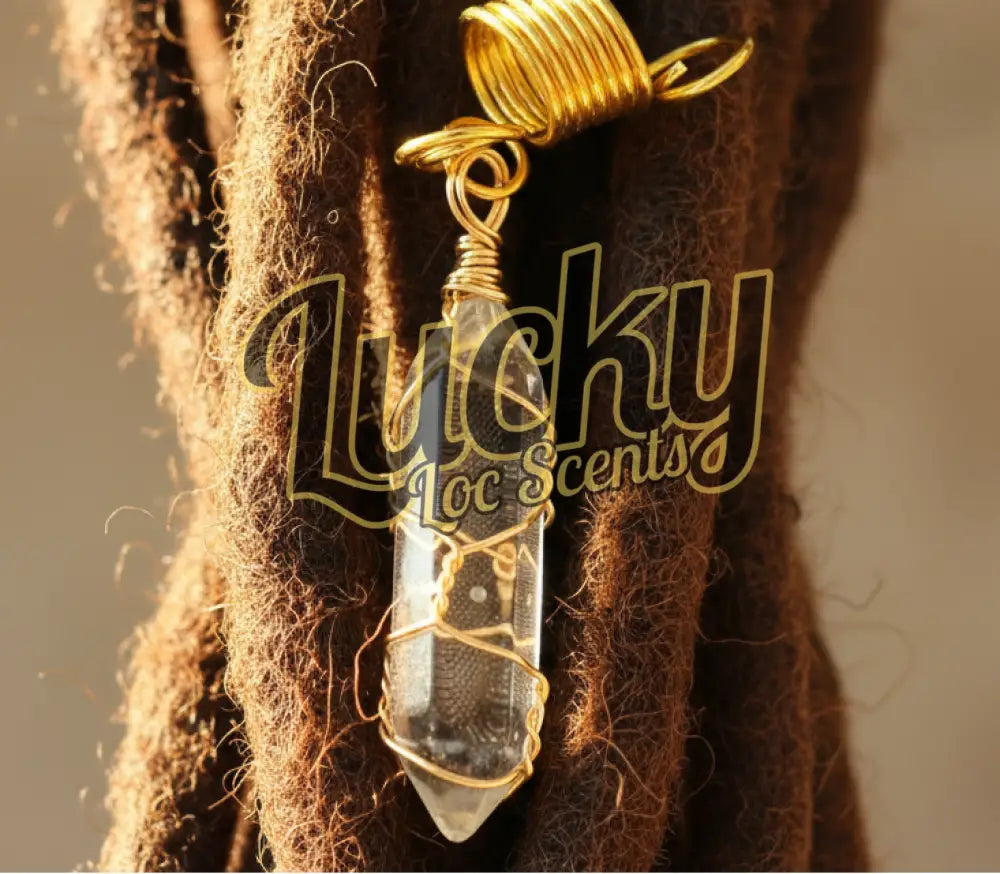 Crystal pendant wrapped in gold wire