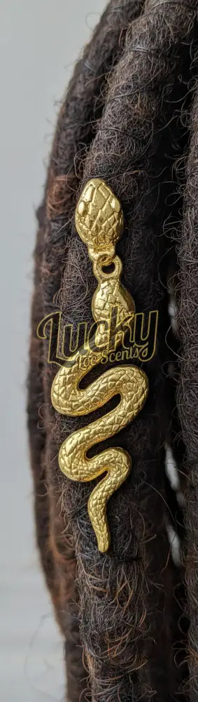 Gold snake-shaped accessory