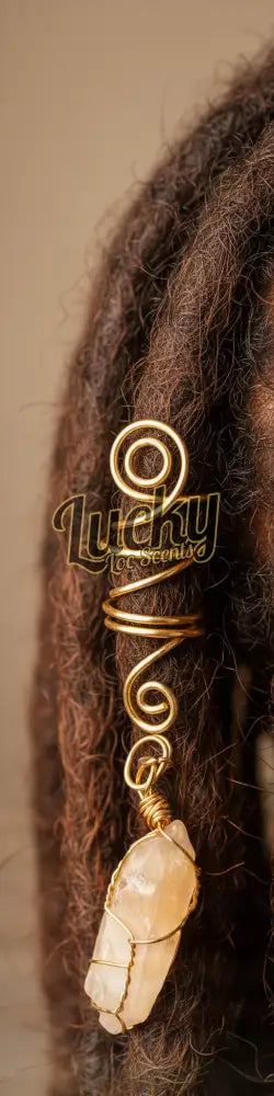 Gold pendant with a central stone